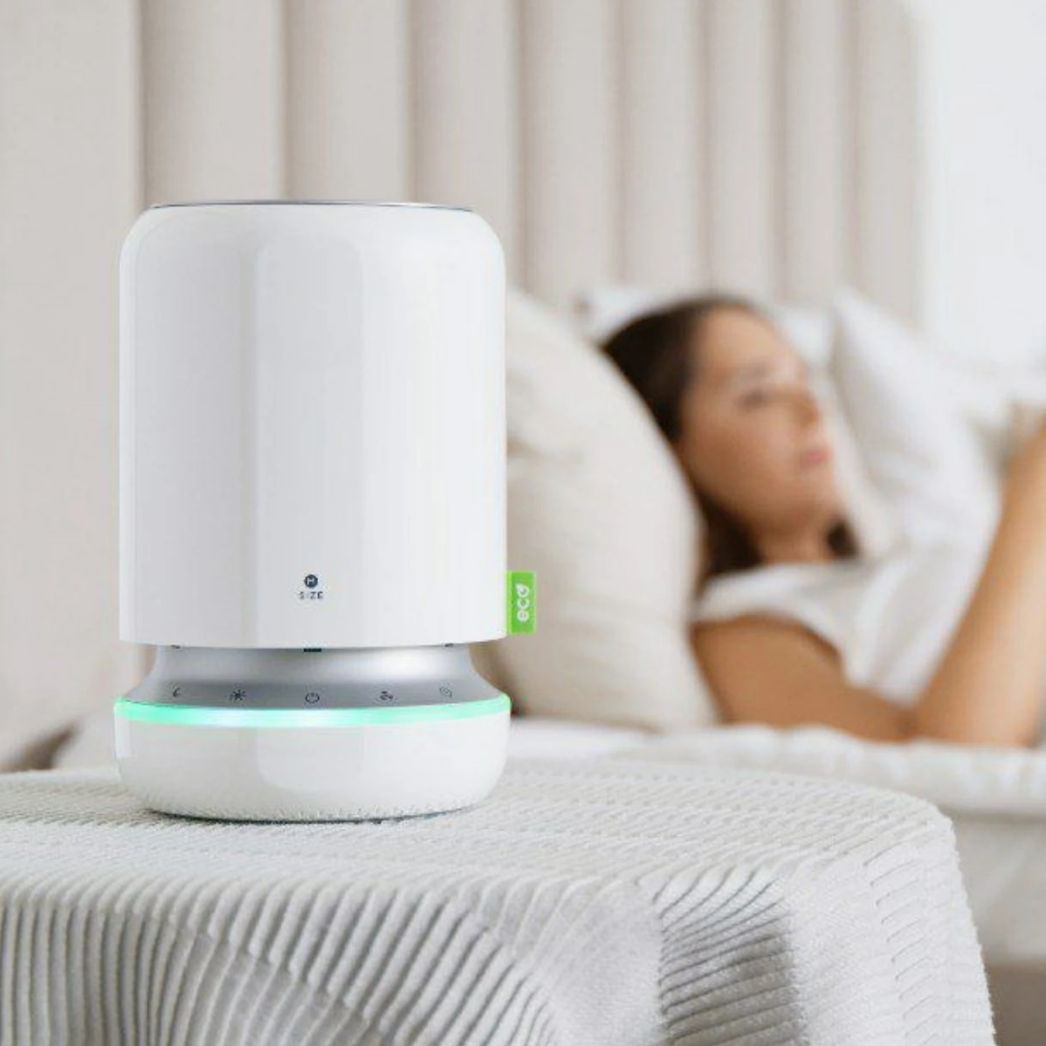 Photocatalytic air purifier on a bedside table